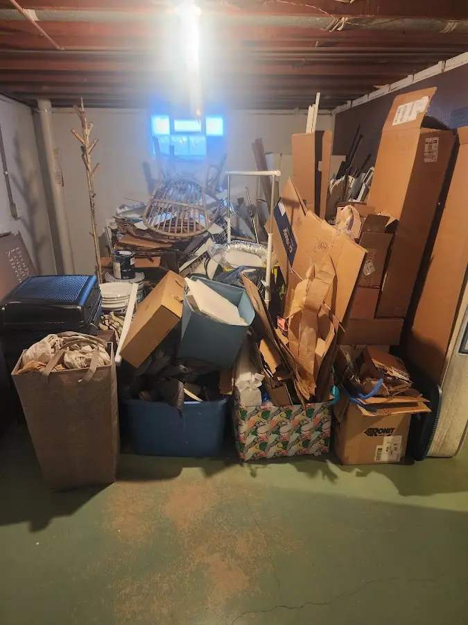 Roll-off dumpster container at job site for 2 Yard Dumpster Rental in Pendleton